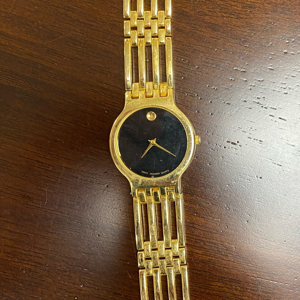 Men’s gold Movado watch